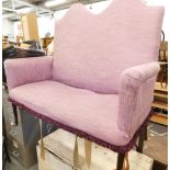 A 19thC Queen Anne style two seater settee, with arched back and cabriole legs, in later purple mate