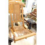 A bergere folding chair.