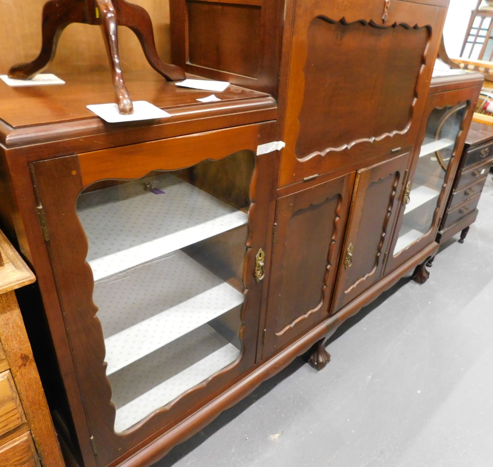 A mahogany bureau cabinet, with two glazed doors on cabriole legs with ball and claw feet, 166cm wid