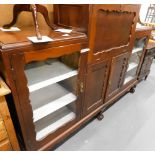 A mahogany bureau cabinet, with two glazed doors on cabriole legs with ball and claw feet, 166cm wid