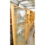 A lightwood corner display cabinet, a pair of six drawer narrow chests.
