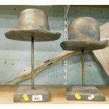 Two various pottery hat sculptures.