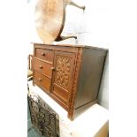 A small oak sideboard, with carved panel door, occasional table, white Melamine dressing table, and