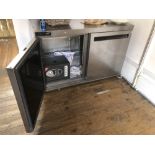 A stainless steel two door unit, incorporating a safe. To be sold upon instructions from Vine's Bake