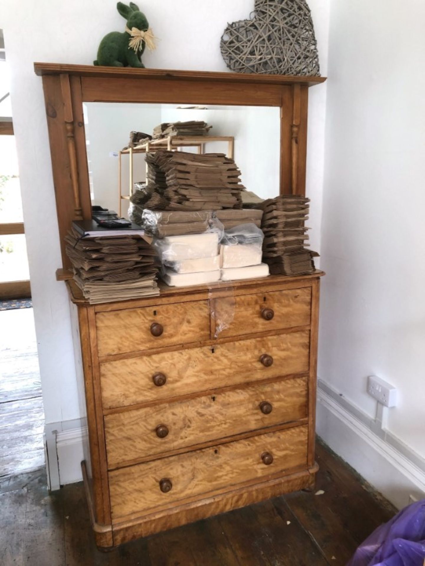 A Victorian satinwood chest of drawers and later mirror. (2) To be sold upon instructions from Vine'