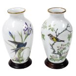 A pair of Franklin Mint porcelain bird vases, limited edition, circa 1980, with stands, comprising T