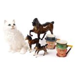 A Beswick pottery model of a seated cat, number 1867, brown glazed horse, right leg up, two foals, a