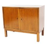 A mid century mahogany cupboard, of two doors, raised on square legs, 67cm high, 80cm wide, 40cm dee