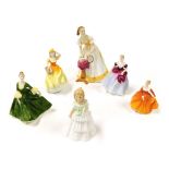 Three Royal Doulton figures, comprising Happy Birthday HN3095, Julie HN2995, and Fragrance HN3220, t