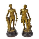 A pair of late 19thC spelter figures of Nelson and Wellington, gold painted, raised on stained woode