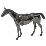 A bronzed spelter model of a thorough bred horse, bears SP in a shield mark, 31cm wide.