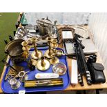 Various brass candlesticks, loose flatware, carved treen framed mirror, plated salver, tripod, a pai