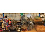 Various painted wooden nutcracker figures, a brass oil lamp with opaque glass shade, bust of a lady,