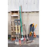 Various garden tools, wooden A frame step ladder, skateboard, saws, etc. (a quantity)