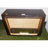 A Philips Bakelite cased radio, 51cm wide. Buyer Note: WARNING! This lot contains untested or unsafe