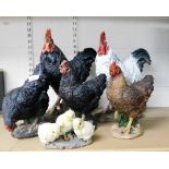 A group of resin chicken and cockerel figures, the largest 41cm high.