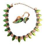 Two items of Matisse enamel jewellery, comprising a brass and green enamel leaf graduated necklace,