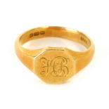 An 18ct gold gentleman's signet ring, with octagonal panel, bearing initials HB, size U, 8.2g.