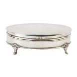 An Edward VII silver oval jewellery box, on acanthus leaf feet, with green velvet lined interior, Bi