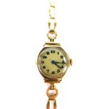 A 9ct gold lady's wristwatch, with small circular watch head and blue hands, 2cm diameter, on elonga