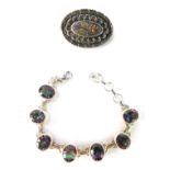 A mystic topaz silver bracelet, with seven oval topaz links, 19cm long, and a Victorian silver oval