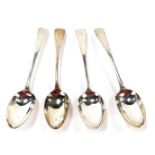 Four Georgian/William IV silver fiddle pattern serving spoons, each bearing the initial B, comprisin