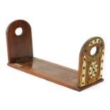 A Victorian mahogany adjustable book rack, with applied brass and bone ends, with sliding rule, 33cm