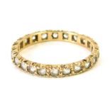 A 9ct gold eternity ring, set with round brilliant cut white stones, size Q, 1.9g all in.
