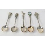 Five souvenir teaspoons, comprising flower top, deer top, Zermatt souvenir crested spoon, and two fl