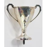 A George VI silver trophy cup, of hammered design, lacking base, Birmingham 1937, 1 ¼oz gross.