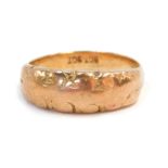 A 9ct gold dress ring, the scroll design rose gold panel, stamped 9ct, 5.4g.