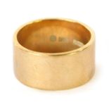 A 9ct gold wedding band, of plain design, size S ½, 9.9g.