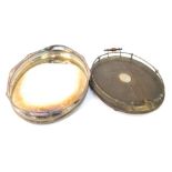 Two serving trays, comprising a silver plated oval serving tray with pierced borders and oak and pla