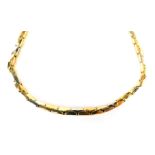 An Italian 18ct gold neck chain, of bi-colour elongated link design with safety clasp and clip, stam