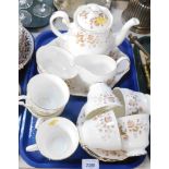 A Colclough Avon pattern part tea service, comprising seven cups, six saucers, cake plate, milk jug,