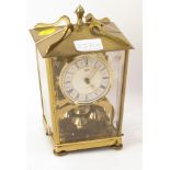 A Schatz brass cased anniversary clock.