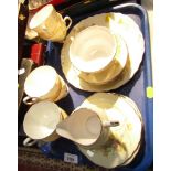 A Colclough yellow spray flower pattern part tea service, comprising cake plate, six cups and saucer