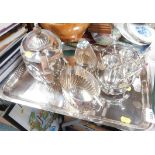 A silver plated serving tray, three piece silver plated fluted teapot, milk jug and sugar bowl, and