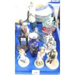 Decorative ceramics, comprising three Wedgwood figure groups, a Carlton ware lustre vase, figure of