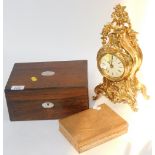A 19thC rosewood work box, a gilt mantel clock and a wooden games case. (3)