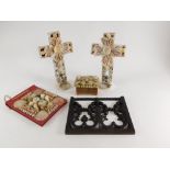 A pair of shell art crucifixes, a blotter with indistinct inscription, a carved oak panel, etc.