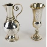 A Victorian silver travelling communion jug, by Jones & Willis, with S scroll handle, beak spout, bu