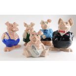 A set of five Wade pig money boxes, each with Natwest black stoppers.