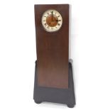 An unusual mahogany ebonised Art Deco style grandmother clock, with painted Roman numeric dial, the