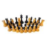 An early 20thC Staunton style chess set, with 10cm high black king, contained in a George III tea ca