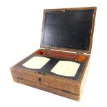 A 19thC pressed leather travelling writing box, of rectangular form, with hinged front revealing a s
