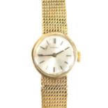 A vintage 9ct gold Longines wristwatch, with 1.5cm dial, baton pointers and numerals, with a meshwor