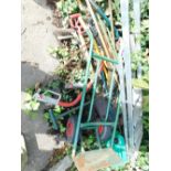 Various hand tools, sack barrow, folding step ladder, saw, rakes, etc. (a quantity)