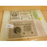 A framed Hunderttaufend banknote mark U0550441 10000 denomination, another German Rechsbank direktor