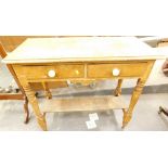 A Victorian painted pine side table, with two frieze drawers and an under tier, 90cm wide. (AF)